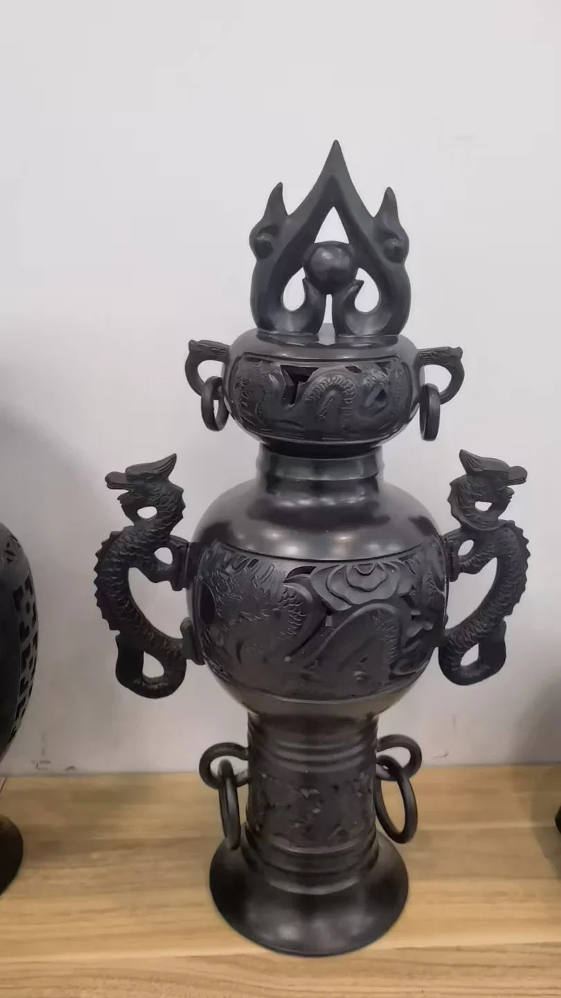 Luxury handcrafted black ceramic dragon vase with ornate sculptural details, heritage style