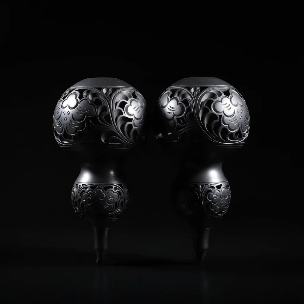 Luxury handcrafted black ceramic art piece with intricate floral carvings on a dark background